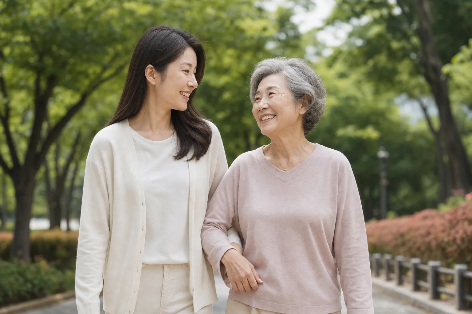 A mother and daughter walking together outdoors